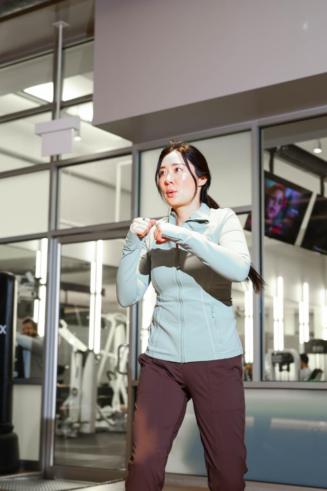 A member shadow boxing during a gym class